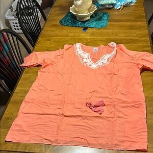 Chic Orange Tunic with Tassel Accents